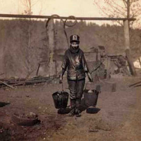 Young greaser Shorpy Higginbotham in the Dora Jefferson Mine, Alabama, 1910