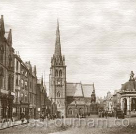 Durham Market Place, dominated by the Church of St Nicholas. c 1910     
The domed structure on the right, with the statue of Neptune on top was 'The Pant', originally the only water supply in the City, which was fed from the Fram Spring up near the railway station. The pant was the responsibilty of a 'Pant Master' who received one shilling (5p) a year. This amount was still being paid to the City Engineer in the 1960's.  Caption from Malcolm Fraser