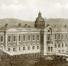 Durham Miners' Hall opened 1915.     
This building on Red Hills replaced the original Miners Hall in North Road, which is still standing and occupied by a night club and an amusement arcade. The upper floor of the front of the old building still has niches set in it which used to house statues of miners leaders.  Caption, Malcolm Fraser