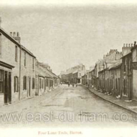The New Inn at Four Lane Ends, Hetton 1907. This is looking south-eastward from the crossroads at Four Lane Ends, towards Pemberton's Bank and Easington Lane.  Just out of sight beyond the houses in the distance was "The White Gates", where the Lambton, Hetton & Joicey Railway crossed the the Lambton, Hetton & Joicey Railway crossed the Easington to Wardley road (later A182), on its way from Hetton Colliery to Elemore Colliery.  "The White Gates" remained the official name for the local bus stop for many years after the railway closed in 1959.  
Caption by Sheldon Clark