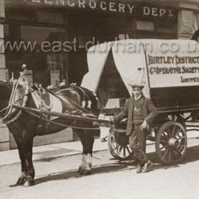Washington Co-op wagon outside the store.