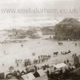 Market stalls on the beach at Blackhall Rocks.     Photograph and caption, Bob Williams